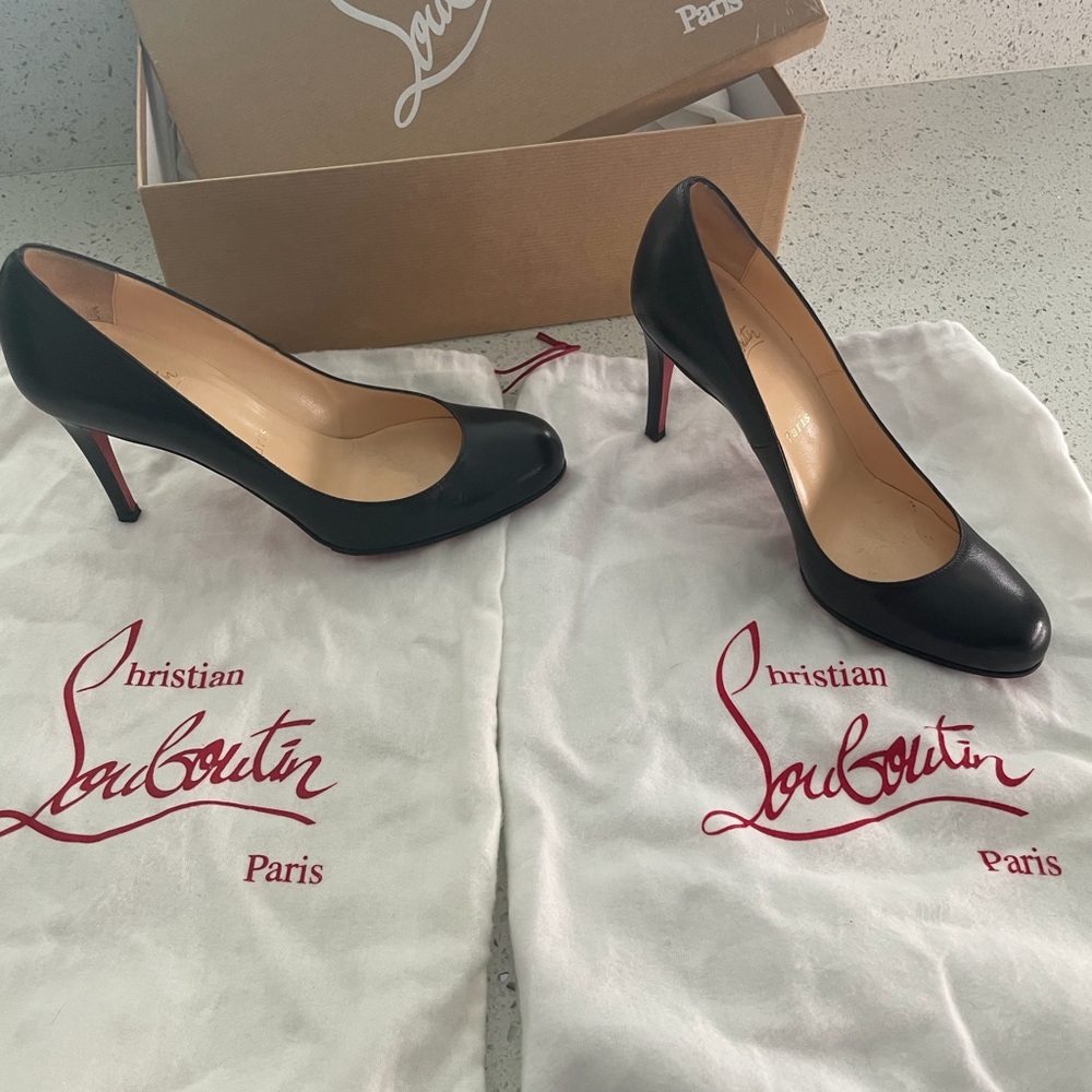 Christian Louboutin Black Leather Pump with Signature Red Sole